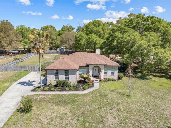 Single-story brick and stucco home with yard in Starke, Florida